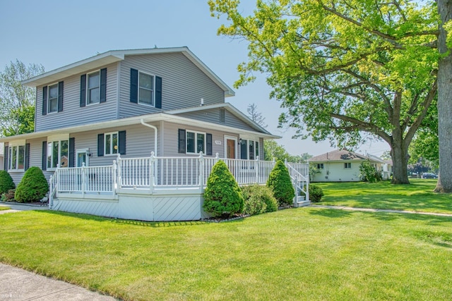 538 Dimmick St, Owosso, MI 48867 - view of front of home with a front yard and covered porch