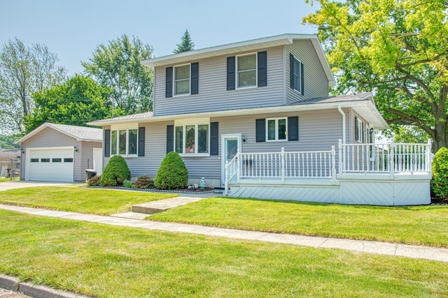 538 Dimmick St, Owosso, MI 48867 - view of front of property with a garage, an outbuilding, a deck, and a front yard