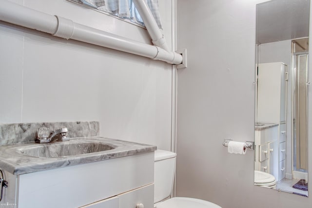538 Dimmick St, Owosso, MI 48867 - bathroom with vanity and a stall shower