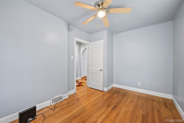 17384 Snowden St, Detroit, MI 48235 - empty room with light wood-style flooring and a ceiling fan