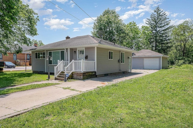 2411 Sheridan Ave, Saginaw, MI 48601 - view of front of house with a garage, an outdoor structure, a front lawn, driveway, and a chimney