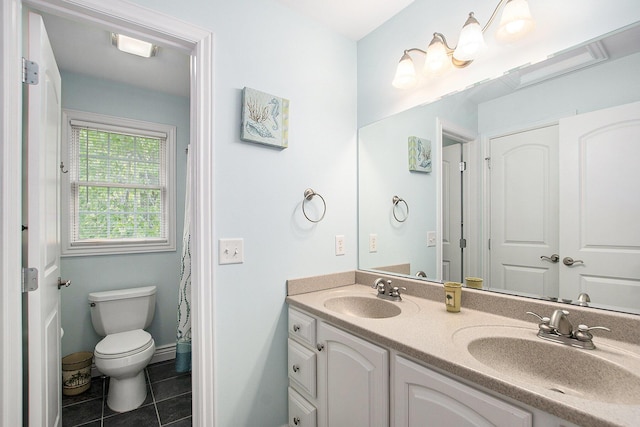 7251 Beverly Dr, South Haven, MI 49090 - bathroom featuring double vanity and tile patterned flooring