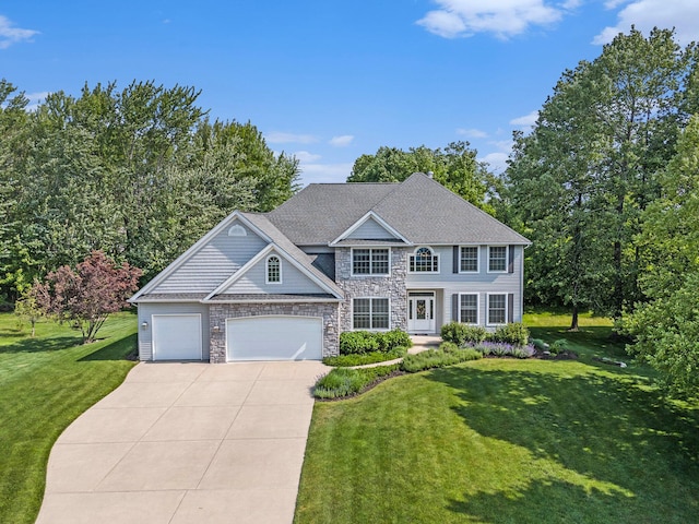 7251 Beverly Dr, South Haven, MI 49090 - view of front of home featuring concrete driveway, a front yard, stone siding, and an attached garage