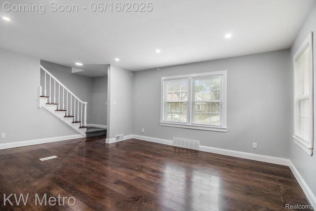 18504 Sussex St, Detroit, MI 48235 - unfurnished living room featuring wood finished floors, stairway, and recessed lighting