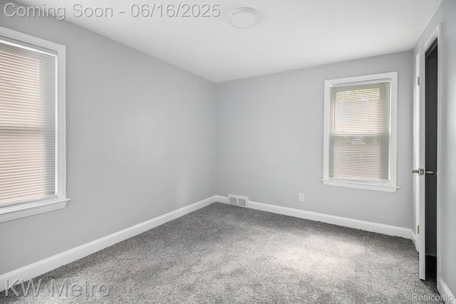 18504 Sussex St, Detroit, MI 48235 - carpeted empty room with baseboards
