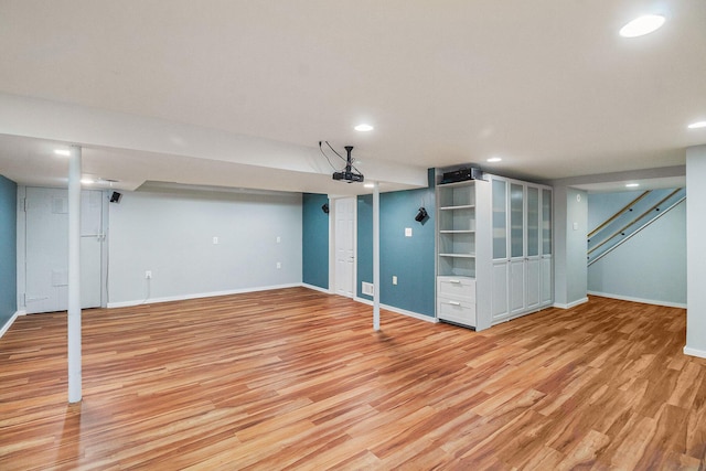 8175 Chamberlin Rd, Dexter, MI 48130 - finished basement with light wood-type flooring, recessed lighting, and stairs