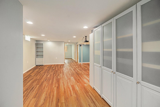 8175 Chamberlin Rd, Dexter, MI 48130 - unfurnished room featuring light wood-type flooring and recessed lighting