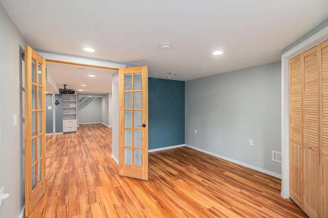 8175 Chamberlin Rd, Dexter, MI 48130 - interior space featuring french doors, wood finished floors, and recessed lighting