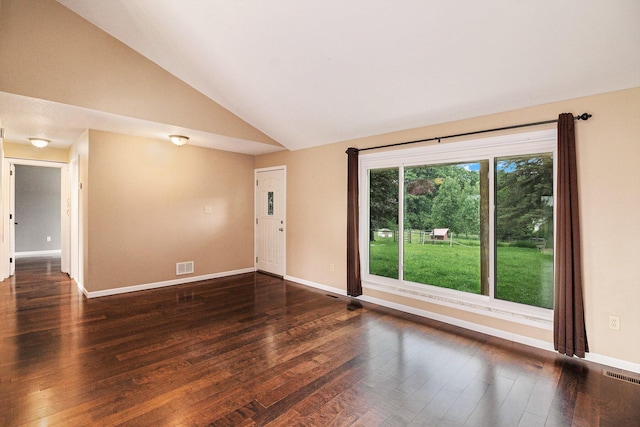 8175 Chamberlin Rd, Dexter, MI 48130 - spare room with vaulted ceiling and wood finished floors
