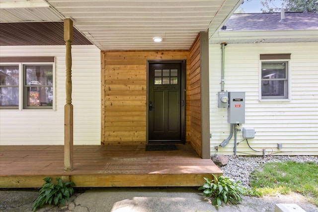 6860 Ashley Ave NE, Belding, MI 48809 - view of exterior entry featuring roof with shingles