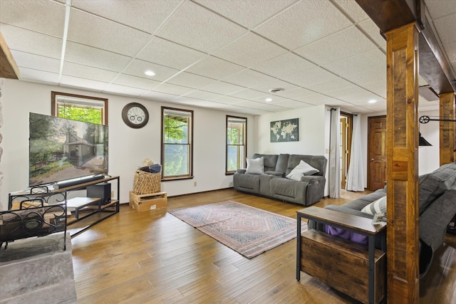 6860 Ashley Ave NE, Belding, MI 48809 - living area with a paneled ceiling, wood finished floors, and recessed lighting