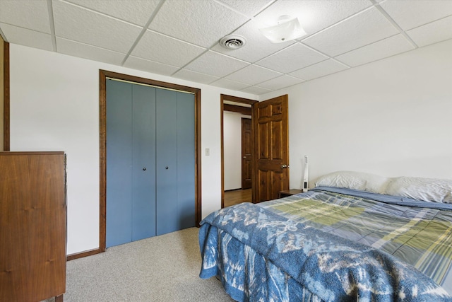 6860 Ashley Ave NE, Belding, MI 48809 - carpeted bedroom featuring a drop ceiling and a closet