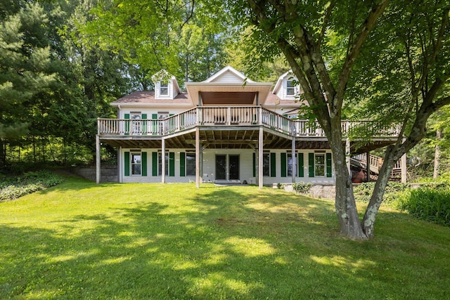 6860 Ashley Ave NE, Belding, MI 48809 - back of house featuring a deck, a lawn, and stairs