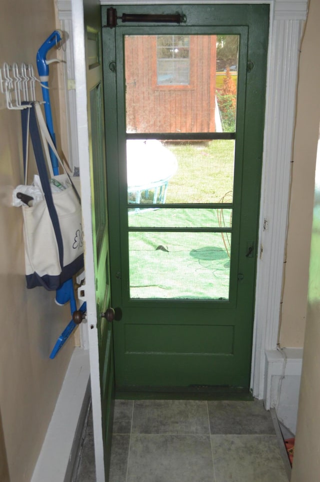 517 Winchester Ave, Saint Joseph, MI 49085 - doorway with healthy amount of natural light and tile patterned floors