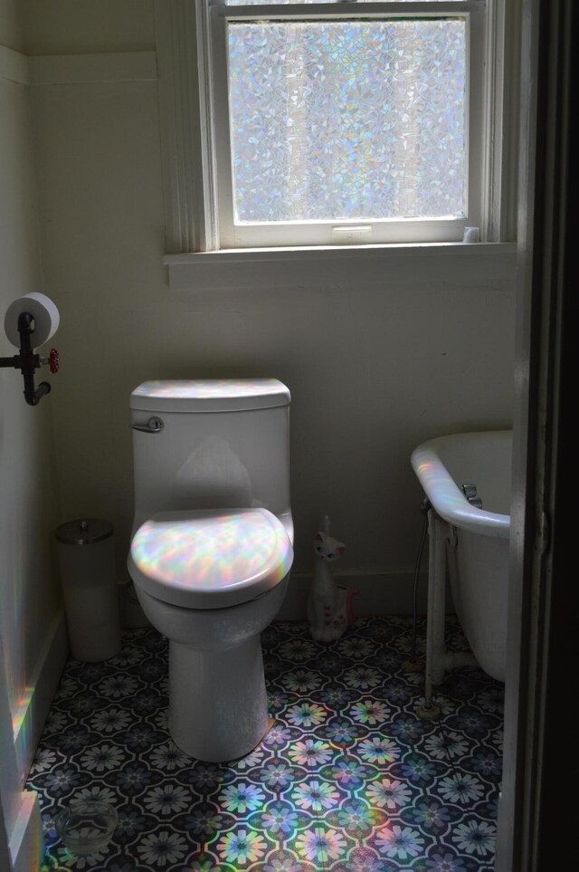 517 Winchester Ave, Saint Joseph, MI 49085 - bathroom with toilet and baseboards