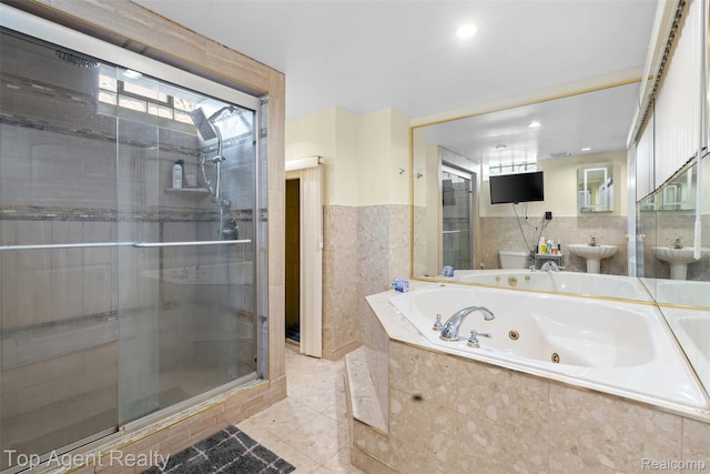 17090 Collinson Ave, Eastpointe, MI 48021 - full bath with a bidet, a stall shower, a tub with jets, tile walls, and tile patterned flooring