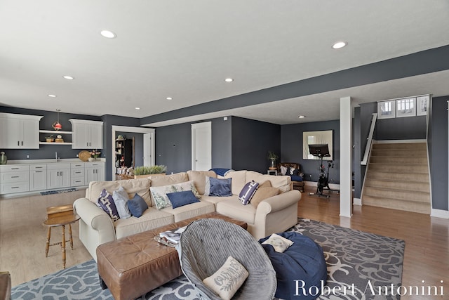 3794 Lake Birch St NE, Grand Rapids, MI 49525 - living room featuring light wood-style flooring, recessed lighting, and stairs