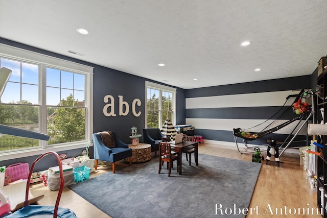 3794 Lake Birch St NE, Grand Rapids, MI 49525 - game room with wood finished floors and recessed lighting