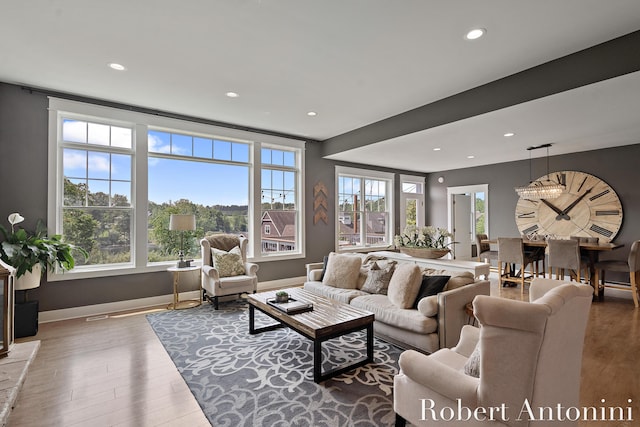 3794 Lake Birch St NE, Grand Rapids, MI 49525 - living area featuring wood finished floors and recessed lighting