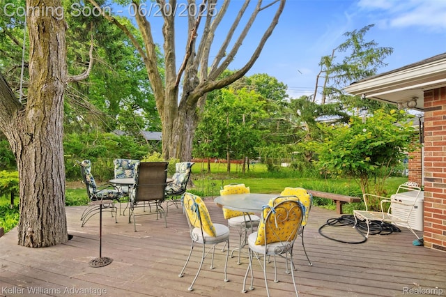 34030 Hampshire St, Livonia, MI 48154 - wooden deck with outdoor dining space