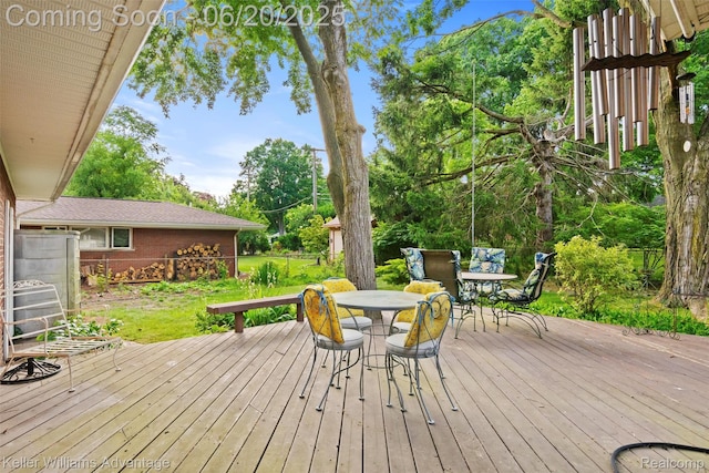 34030 Hampshire St, Livonia, MI 48154 - wooden deck featuring outdoor dining area