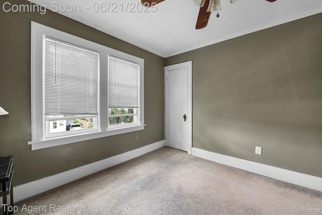136 Alice Ave, Bloomfield Hills, MI 48302 - carpeted spare room featuring a ceiling fan and crown molding