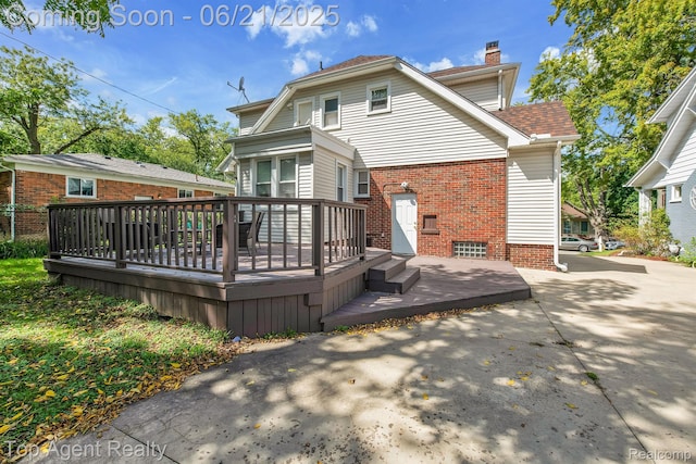 136 Alice Ave, Bloomfield Hills, MI 48302 - rear view of property featuring brick siding, a deck, a chimney, and a patio area