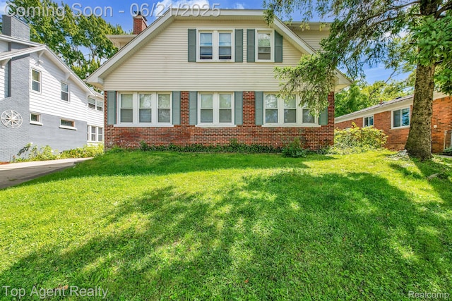 136 Alice Ave, Bloomfield Hills, MI 48302 - bungalow featuring a front yard, brick siding, and a chimney