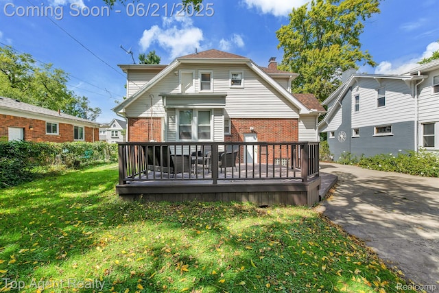 136 Alice Ave, Bloomfield Hills, MI 48302 - rear view of house featuring brick siding, a deck, a lawn, and a chimney