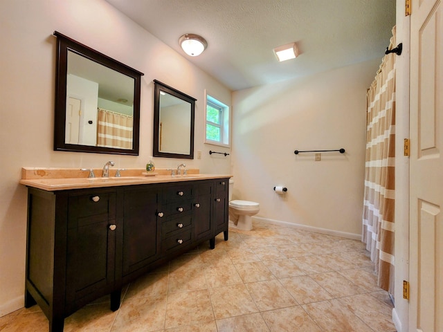 8456 Torreyhill Ct, Elmira, MI 49730 - full bathroom featuring double vanity, tile patterned floors, a textured ceiling, and a shower with curtain