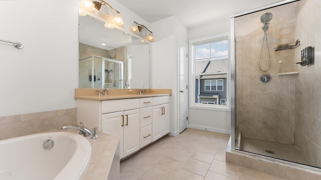 2949 Aughton Rd, Ann Arbor, MI 48105 - bathroom featuring a stall shower, double vanity, a garden tub, and tile patterned flooring