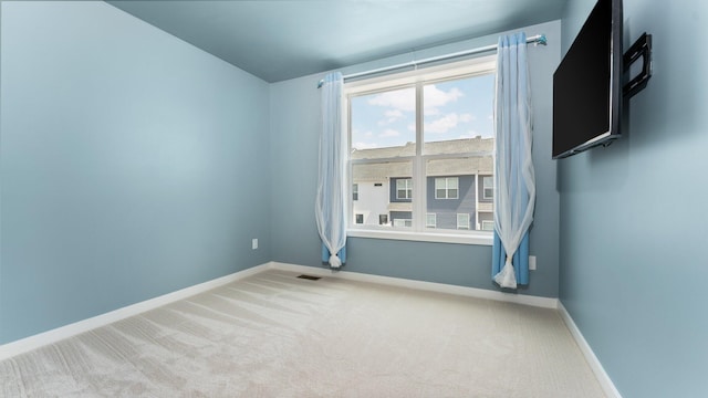 2949 Aughton Rd, Ann Arbor, MI 48105 - empty room featuring carpet flooring and vaulted ceiling