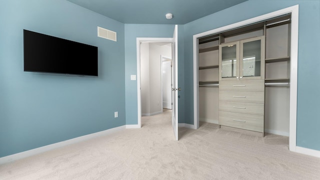 2949 Aughton Rd, Ann Arbor, MI 48105 - unfurnished bedroom featuring light carpet and a closet