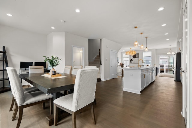 2949 Aughton Rd, Ann Arbor, MI 48105 - dining space with stairs, dark wood-style flooring, recessed lighting, and a chandelier