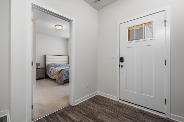 2949 Aughton Rd, Ann Arbor, MI 48105 - foyer with dark wood-style flooring and baseboards