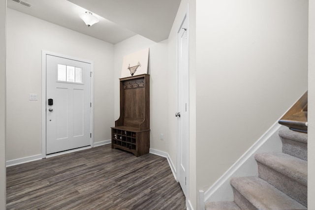 2949 Aughton Rd, Ann Arbor, MI 48105 - entrance foyer with dark wood-style floors and stairs
