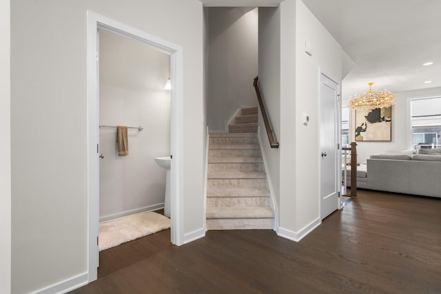 2949 Aughton Rd, Ann Arbor, MI 48105 - stairs with wood finished floors, a chandelier, and recessed lighting