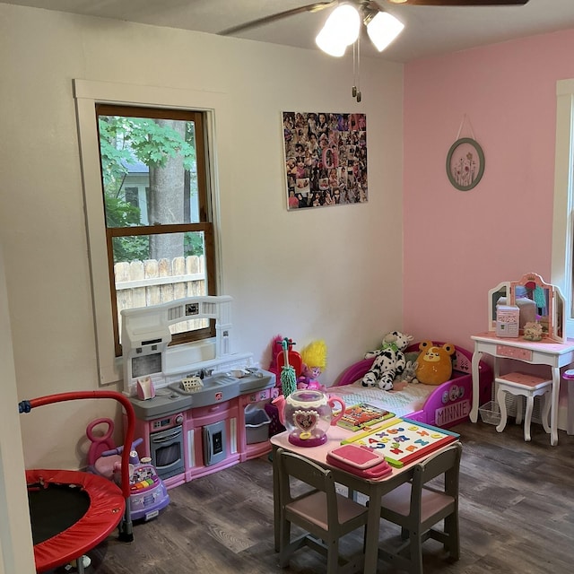2383 Holton Rd, Muskegon, MI 49445 - rec room featuring dark wood-type flooring and a ceiling fan