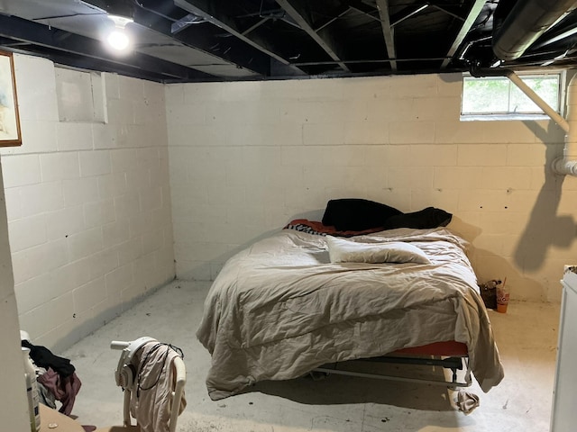 2383 Holton Rd, Muskegon, MI 49445 - bedroom featuring unfinished concrete flooring