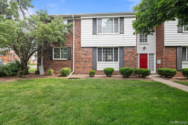 25316 Shiawassee Cir Unit 103, Southfield, MI 48033 - multi unit property featuring a front yard and brick siding
