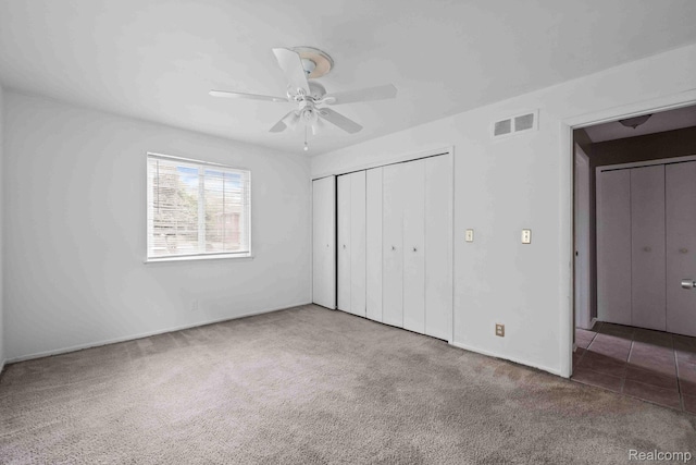 25316 Shiawassee Cir Unit 103, Southfield, MI 48033 - unfurnished bedroom with carpet flooring, a closet, and a ceiling fan