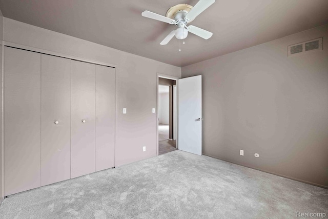 25316 Shiawassee Cir Unit 103, Southfield, MI 48033 - unfurnished bedroom featuring carpet flooring, a closet, and ceiling fan