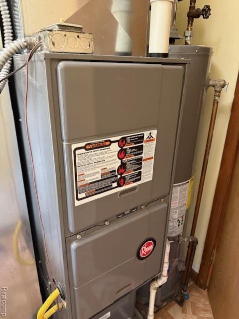 5496 Elizabeth Lake Rd, Waterford, MI 48327 - utility room featuring heating unit