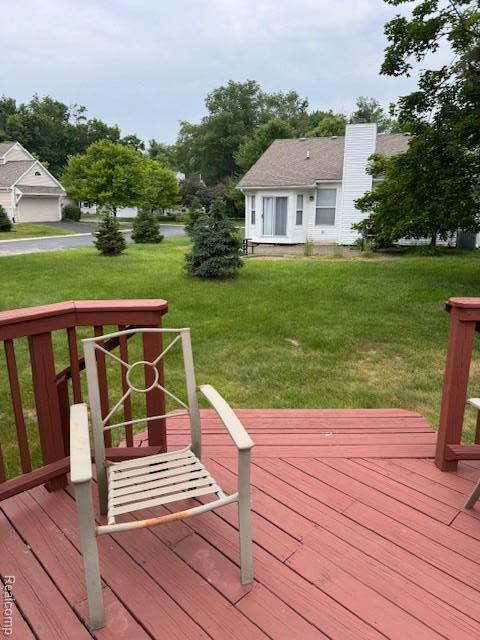 912 Rikki Anne Ct, Wixom, MI 48393 - wooden terrace with a yard