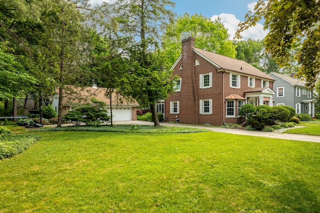 1208 Whittier Rd, Ypsilanti, MI 48197 - view of home's exterior with a chimney, brick siding, and a lawn
