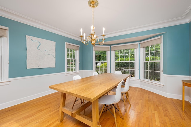1208 Whittier Rd, Ypsilanti, MI 48197 - dining room with ornamental molding, a chandelier, hardwood / wood-style flooring, and plenty of natural light