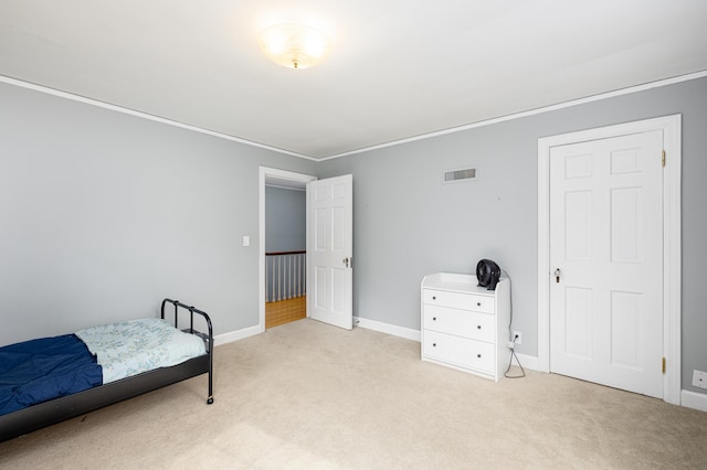 1208 Whittier Rd, Ypsilanti, MI 48197 - bedroom with carpet and crown molding
