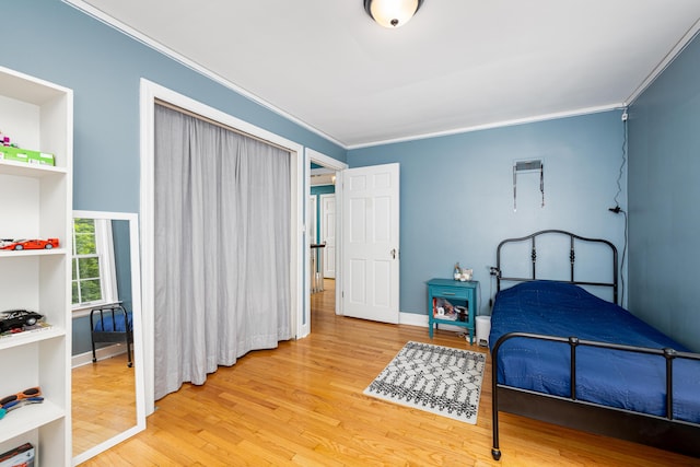 1208 Whittier Rd, Ypsilanti, MI 48197 - bedroom with light wood-style floors and ornamental molding