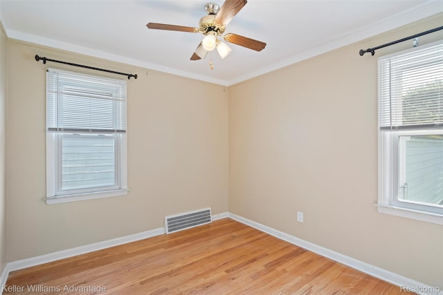 3434 Campbell St, Dearborn, MI 48124 - unfurnished room with light wood-type flooring, a ceiling fan, and crown molding