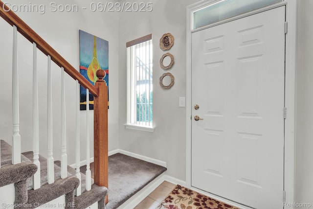 3581 Oakmonte Blvd Unit 60, Rochester, MI 48306 - entryway with stairs, healthy amount of natural light, and light tile patterned flooring